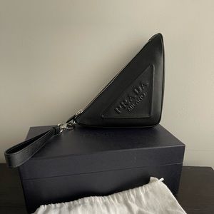 Prada Triangle Pouch / clutch in black saffiano leather. Like New.